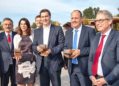Wolfgang A. Herrmann, Präsident der TU München und Berater der geplanten TU Nürnberg, Wissenschaftsministerin Marion Kiechle, Ministerpräsident Markus Söder, Bürgermeister Christian Vogel und Aurelis-Geschäftsführer Stefan Wiegand (v.l.n.r.)